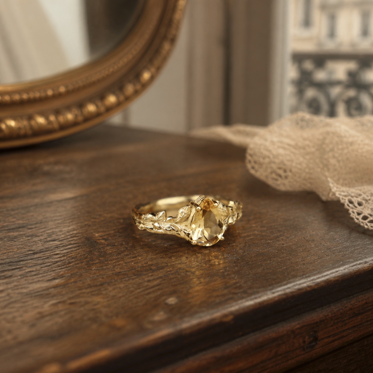 Solène natural citrine leaf ring on a vintage walnut dresser