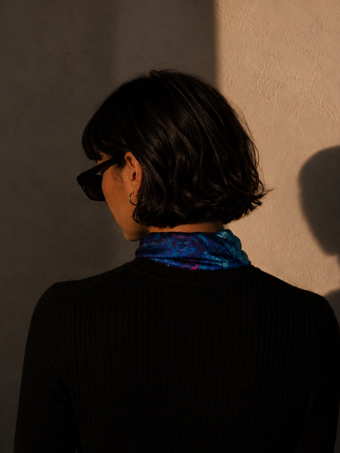 Bobbie Berlin seen from behind wearing the Miami Vice silk scarf